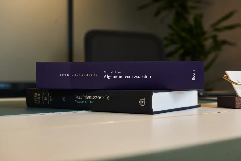 Stacked_books_on_desk